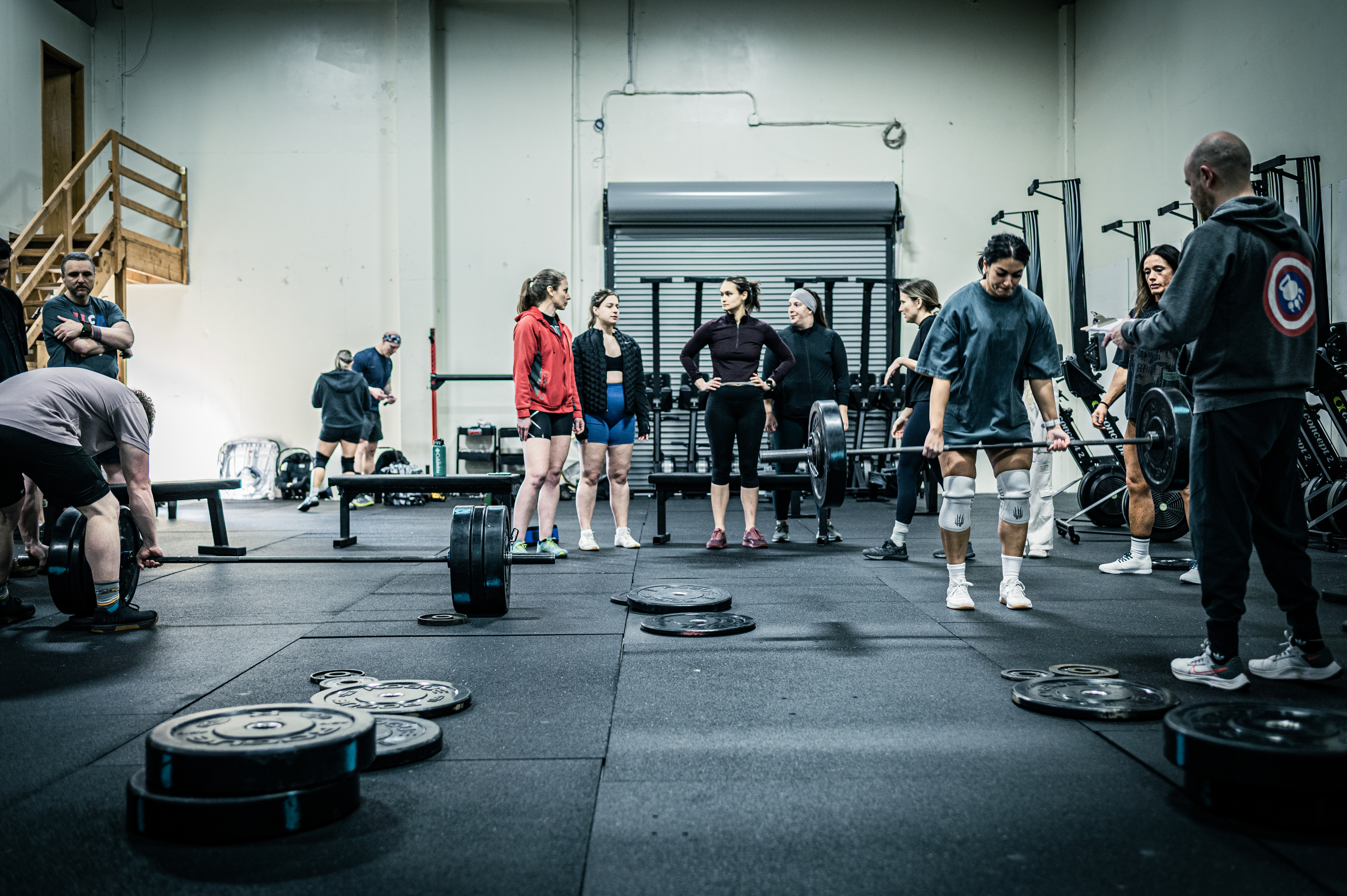 Group CrossFit class with barbells at CrossFit Tigard